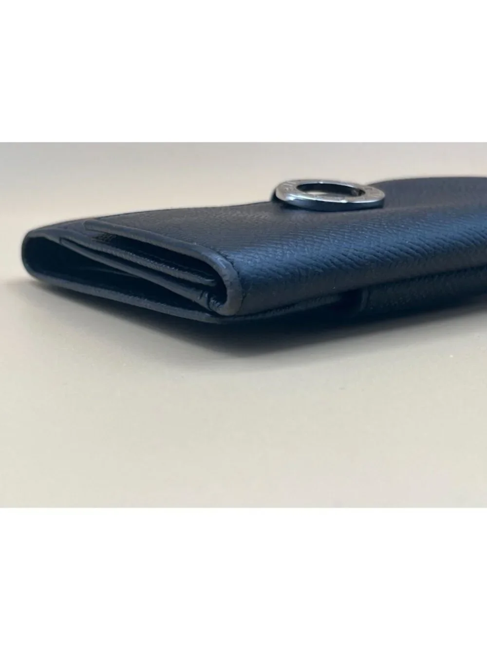 BVLGARI BVLGARI Black Grained Leather Compact Bifold Wallet Silver Ring Clasp